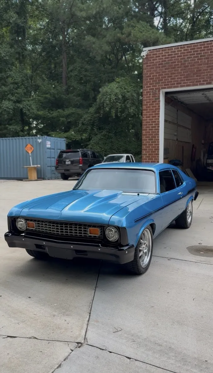 Restored blue Chevrolet Nova after a full detail