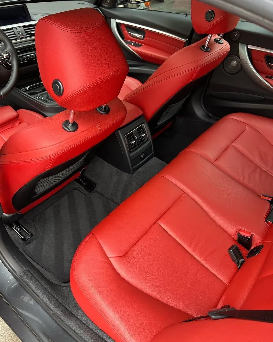 Red leather car interior after deep cleaning